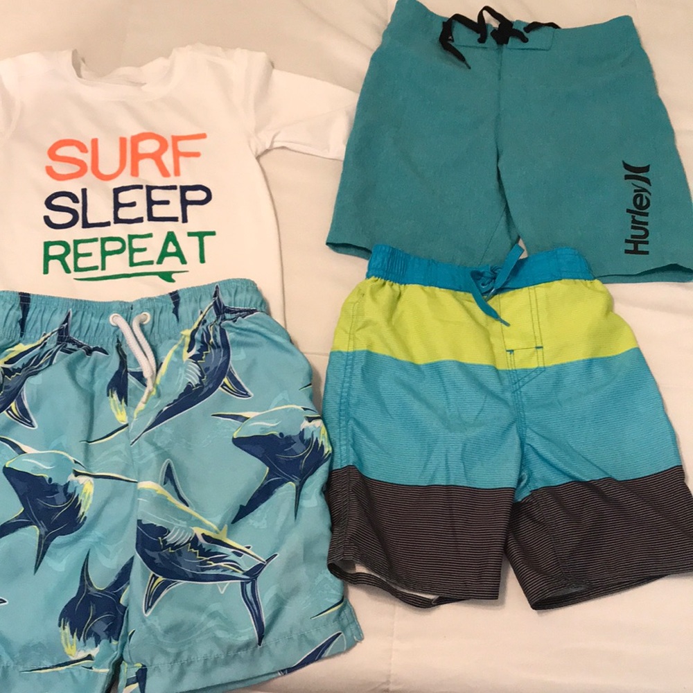 Lot of boys swimming trunks and shirt